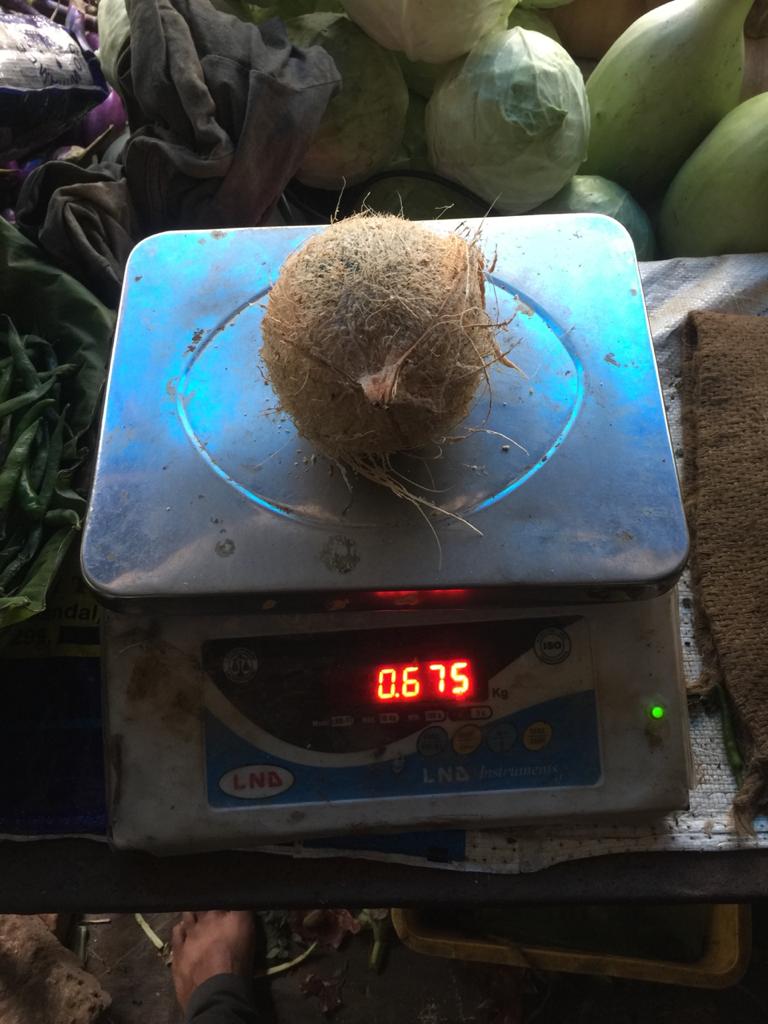 Coconut on weighing machine