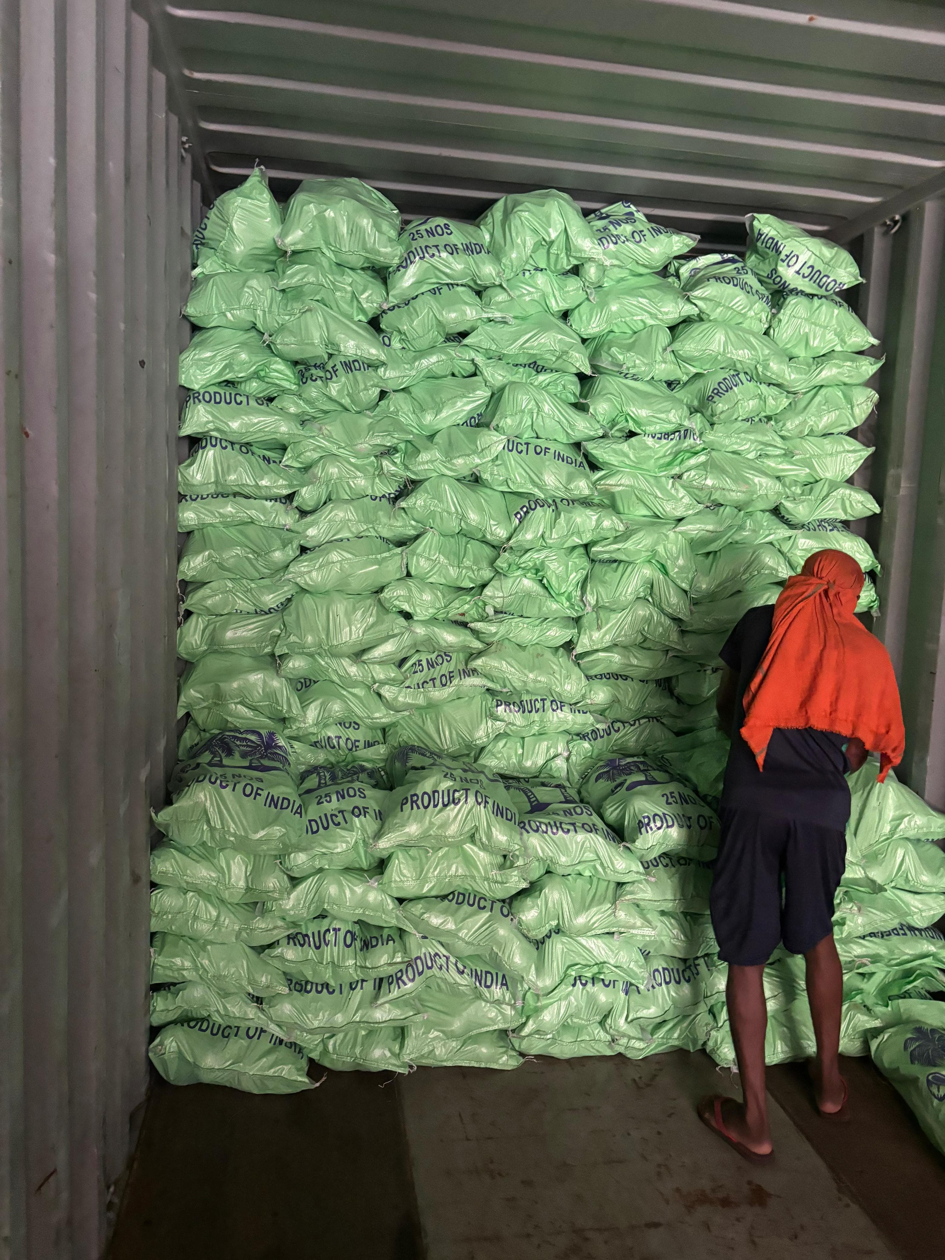 Produce sacks loaded in container